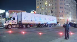 US, Los Angeles: Larchmont Vehicle Wedged Under Semi Truck