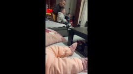 Generational Harmony: A Little Boy Sings Along with His Grandfather