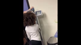 Children step on clinic scale in Dallas, Texas, USA