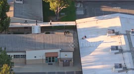 US, Los Angeles: Santa Clarita Teen Skateboarders Pull Dangerous Stunts on Elementary School Roof