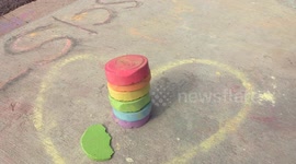 US: The LGBTQ+ movement is repainting with chalk the crosswalk that was shut down by the Florida Department