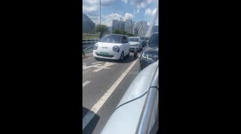 Detached wheel rolls through traffic in Zhejiang, China