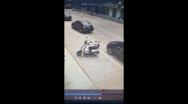 Responsive Boy Holding the Scooter Crying