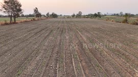Rural Thailand in Contrast: Dry February to Green July, an aerial view of the contrast between wet and dry season.