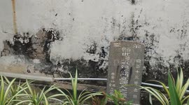 Hidden Tomb Nestled in Jonker Walk World Heritage Park in Malacca, Malaysia