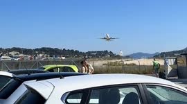 Dramatic moment plane's engine shoots out flames seconds after take-off