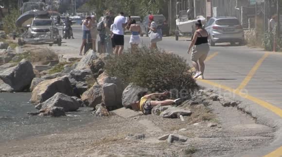 Tourist thrown against rocks as she's hit by jet blast from plane at Skiathos Airport