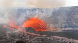 Rare 'volnado' whirlwind seen as lava spews