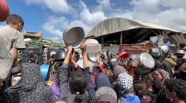 Famine worsens in Gaza as civilians scramble for aid, death toll rises