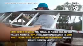 New Mexico Officer Rescues Woman, Child, Dog From Floodwaters