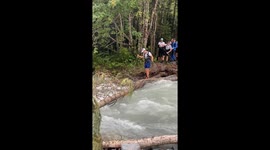 Crossing A River In The Arkhyz Mountains