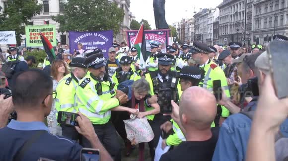 Arrests have began on Parliament Square, as protest action against the prescription of Palestine Action takes place. London,  England