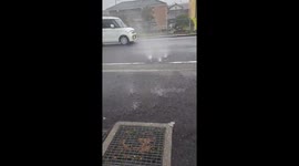 Heavy rain turns manholes into fountains in Chiba, Japan