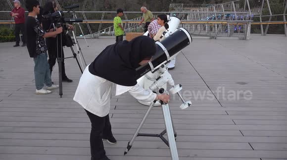 Blood moon observed with telescopes over Tehran