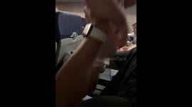 Baby startled but safely caught on plane in Dallas, Texas