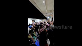 Frenzied fans block passengers from entering train as they chase actor Chinese actor through station