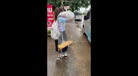 Foodie carries giant bag of papaya salad onto bus