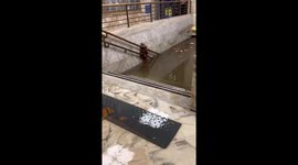 Train station flooded as heavy rains batters Italy