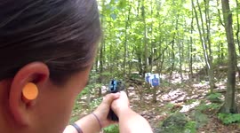 Pony tail girl practicing how to shooting