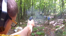 Young man practicing his marksmanship
