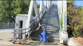 Man skis down stairs in downtown Portland