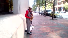 Side view of street musician in Philadelphia