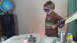Young boy scares himself by lighting a sparkler