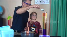 Young boy super excited by science demonstration