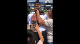 Young cadet battles to stay in formation during emotional reunion with family