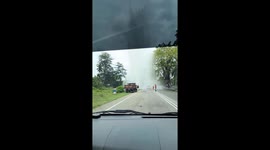 Passing vehicles gets free car wash from burst pipeline