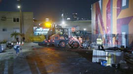 US, Los Angeles: Downtown Los Angeles Sanitation Department Removes Piles Of Rotting Food