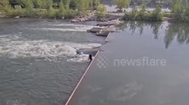 US: Surfer Catches Waves On Boise River Amid Perfect Morning Weather