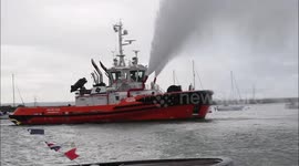 Modern tugboat's spectacular demo alongside vintage tug in Kent, UK