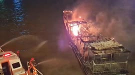 Three wooden tourist boats catch fire on Bangkok river