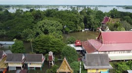 Villages flooded in central Thailand as river swells from weeks of rain