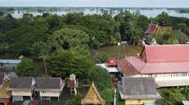 Villages flooded in central Thailand as river swells from weeks of rain