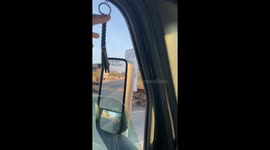 Trucker Makes Friend at the Tracks