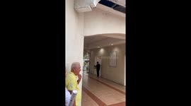 Grandfather dances with bouquet in birthday surprise for wife