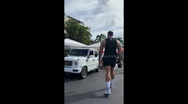 6’10” bodybuilder’s struggle to fit in G-Wagon goes viral with 21M views
