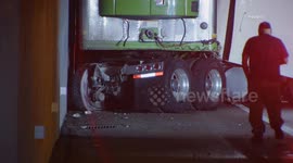 US, Los Angeles: Griffith Park Semi Jackknifes In Rain And Blocks Freeway Lanes