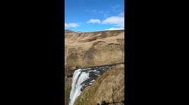 Where Water Meets Light: Skógafoss in Rainbow Veil