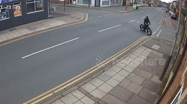 CCTV shows shocking moment yob rips down beauty salon's Pride flag