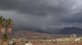 US: Thunderstorm Clouds Race Across San Ysidro Mountain