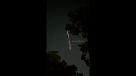 Friends gasp as 'fireball' streaks across night sky above northern India