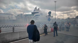 Police targeted with smoke flares during Gaza protest in Genoa port