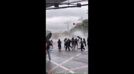 Protesters attack police at anti-corruption rally in the Philippines