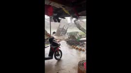 Super Typhoon Nando damages houses and sweeps streets in Nagsayaoan, Philippines
