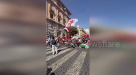 Italy: Protesters March In Naples With Palestinian Flags And Red Star Banner