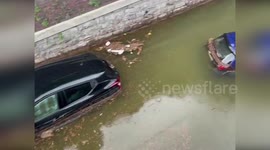 Italy: Firefighters Work To Clear Flood Debris In Como