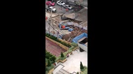 Dramatic moment road opens up swallowing cars in Bangkok